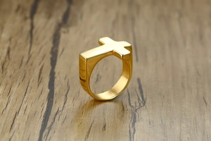 Detailed top view of a high-polished golden stainless steel cross ring for men