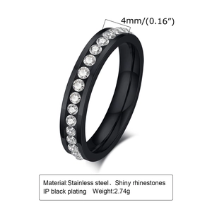 Close-up of 4mm black stainless steel ring with half-circle inlaid shiny white zircons
