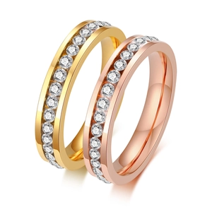 Polished gold and rose gold stainless steel eternity rings with inlaid sparkling crystals