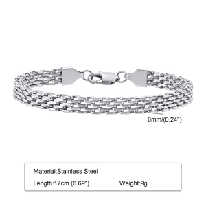 Detailed macro view of 6mm wide stainless steel mesh bracelet with secure lobster clasp
