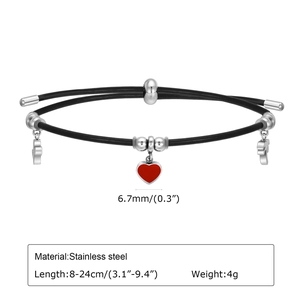 Detail view of adjustable black cord bracelet with stainless steel beads and red heart