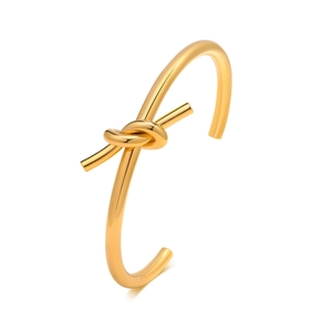 Polished minimalist gold-tone stainless steel knot open cuff bracelet for women