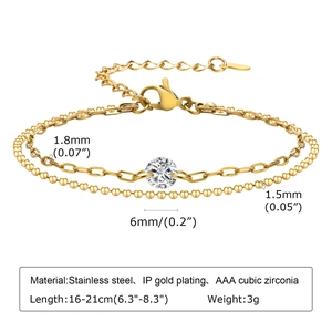 Dettaglio di un bracciale a doppio strato in acciaio inossidabile dorato con zircone da 6mm