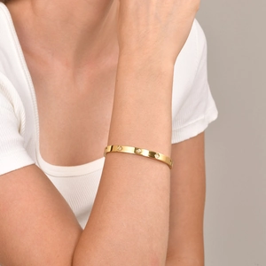 Bracciale rigido in acciaio inossidabile dorato con tre pietre di zircone quadrato da donna