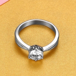 Classic silver crown ring with a sparkling round solitaire diamond in a six-prong setting