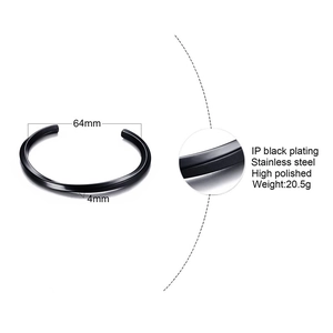 Detail view of 64mm black stainless steel twisted cuff bracelet with size measurements