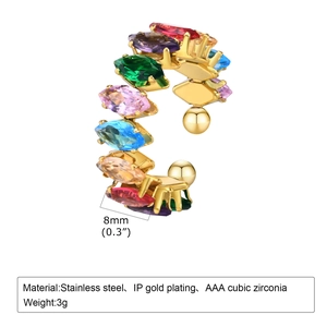 Macro detail of gold plated stainless steel ring with colorful marquise cubic zirconia