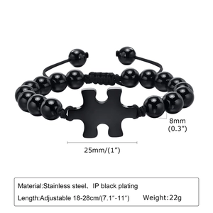Adjustable black agate bead bracelet with stainless steel puzzle charm on white background