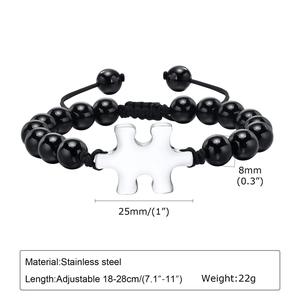 Detail of adjustable black agate beaded bracelet with stainless steel puzzle charms