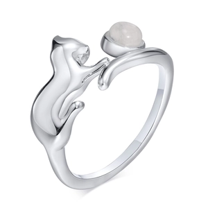Adjustable silver ring with cat motif and round moonstone inlay on a white background