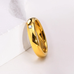 Macro shot of 4mm rose gold tungsten carbide ring with a single round zircon inlay