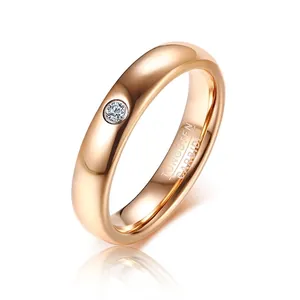 Minimalist rose gold tungsten carbide ring with a 4mm band and single zircon inlay