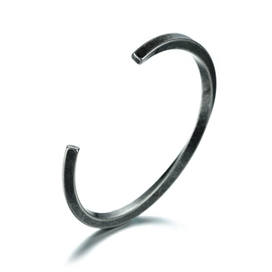 Minimalist vintage twisted open cuff bracelet in dark grey stainless steel finish