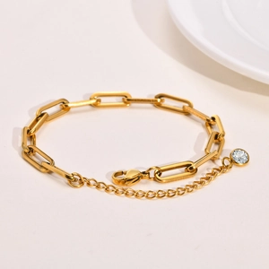 Elegant gold-plated stainless steel paperclip chain bracelet with a sparkling zircon charm