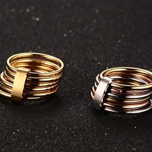 Polished stainless steel stacked multi-layer rings in gold and tricolor finishes