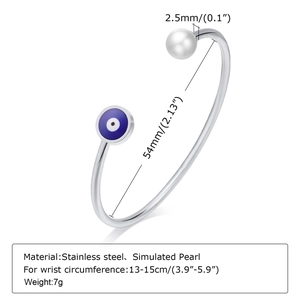 Detail showing 54mm inner diameter and simulated pearl on gold evil eye bangle
