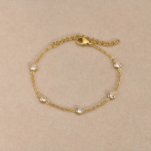 Minimalist gold stainless steel bracelet for women with five inlaid round white zircons
