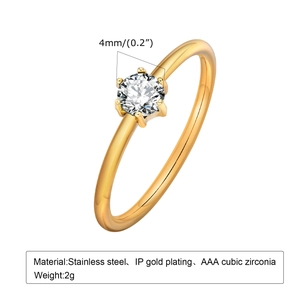 Macro detail of gold stainless steel ring featuring 4mm AAA cubic zirconia inlay