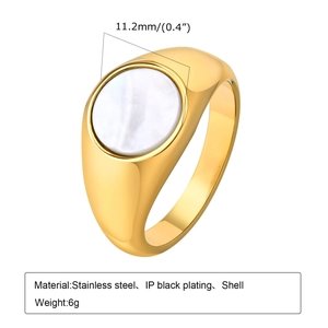 Golden stainless steel round signet ring for women featuring a white shell inlay