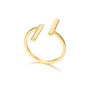 Detail of minimalist gold open ring featuring unique parallel vertical geometric bars