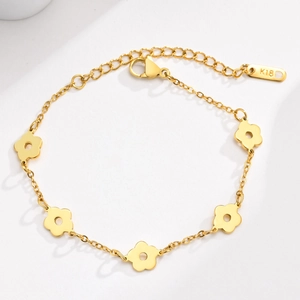 Bracelet floral en acier inoxydable doré avec cinq breloques fleurs et poinçon K18 gravé