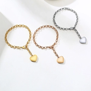 Ensemble de bracelets cœur en or, or rose et argent avec fermoir mousqueton réglable