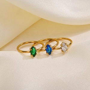 Three-piece set of gold stainless steel rings featuring marquise-cut colored zircon stones