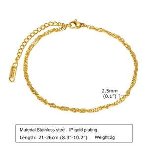 Detail of 2.5mm gold water wave chain with lobster clasp and S.Steel logo tag