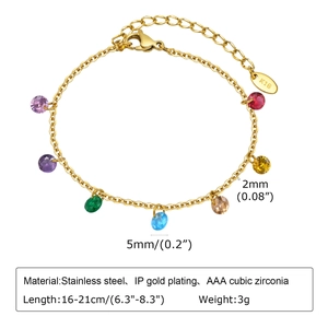 Macro view of gold chain with 7 colorful 5mm cubic zirconia charms and lobster clasp