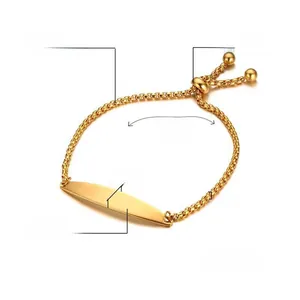 Detailed view of polished gold stainless steel curved bar bracelet with adjustable pull-chain