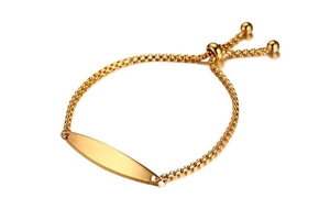 Close-up of gold-plated box chain bracelet with adjustable bolo clasp and smooth curved plate