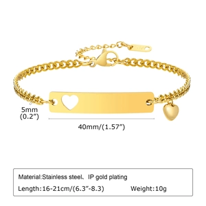Detailed view of adjustable gold stainless steel ID bracelet with heart cutout details