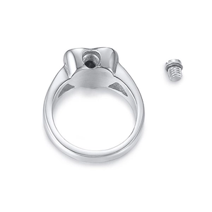 Detailed macro view of heart cremation ring with a removable sealing screw for ashes