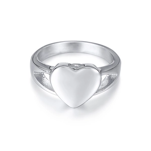 Detailed macro view of the silver heart urn ring with hollow structure and polished finish