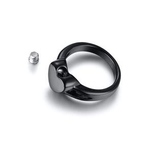 Detail of black heart urn ring showing detachable screw for ashes and internal cavity