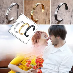 Three-color C-shaped stainless steel bangles with personalized laser engraving detail