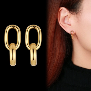 Boucles d'oreilles créoles à double maillon en titane doré au design ovale minimaliste