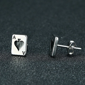 Macro detail of Ace of Spades stainless steel stud earrings with polished silver finish