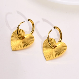 Golden stainless steel heart hoop earrings with radiant sunburst texture finish