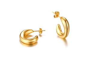 Detailed view of polished gold chunky C-shaped stud earrings with butterfly backs