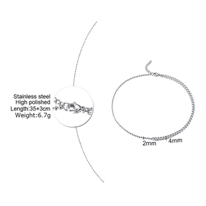 Detail of 18K gold-plated stainless steel bead and link chain with lobster clasp