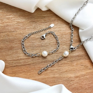 Polished stainless steel necklace and bracelet set with white freshwater pearls