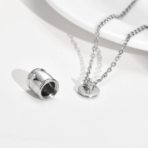 Collier urne en acier poli avec pendentif cylindrique pour cendres et bijoux commémoratifs