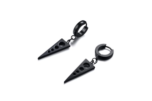 Macro view of matte black geometric triangle earrings with hollow circle cutouts