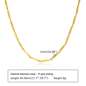 Detailed view of 2mm twisted bar link chain necklace in 18k gold plated stainless steel