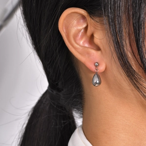 Minimalist silver teardrop earrings for women in polished stainless steel finish