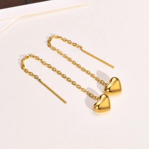 Elegant gold stainless steel heart tassel earrings with thin chain and polished heart pendant
