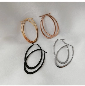 Detailed set of four large oval hoop earrings in gold, rose gold, black and silver finishes