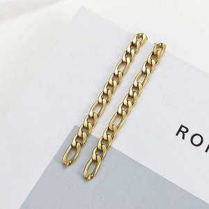 Elegant golden Figaro chain tassel earrings for women with minimalist long drop design
