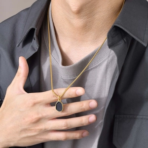 Men's gold-plated stainless steel necklace featuring a black irregular oval pendant charm